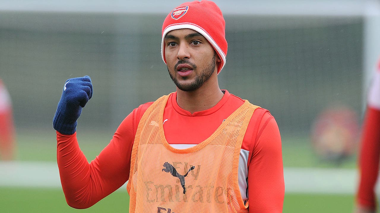 Arsenal forward Walcott has outside chance of facing Liverpool